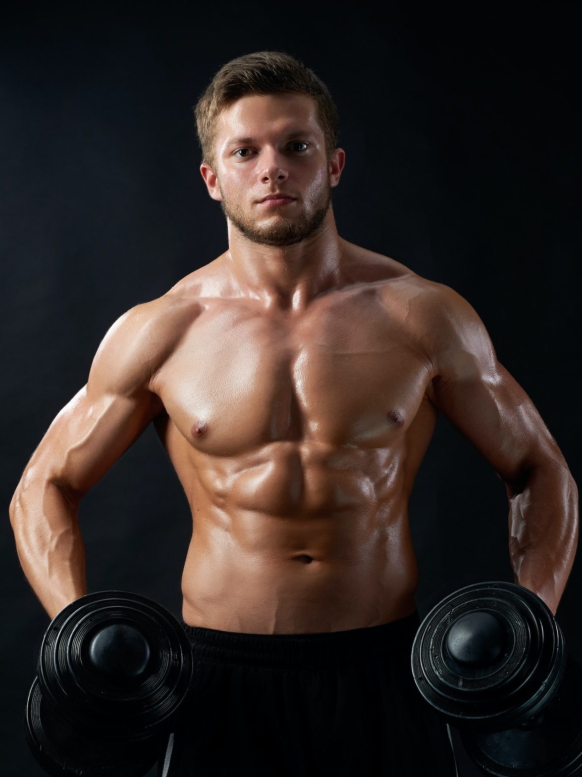 young-fitness-man-in-studio-e1623411710701.jpg